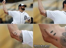 Tigers RHP Joba Chamberlain and his TJ tattoo